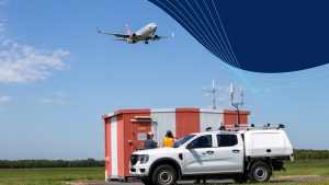 A plane overflies an Airservices facility and vehicle